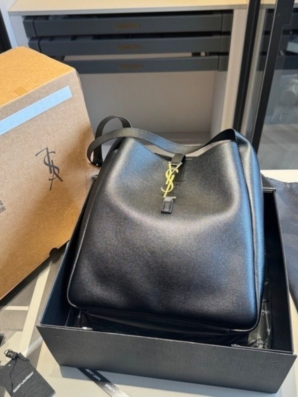 Saint Laurent Black Leather Bucket Bag with YSL Charm